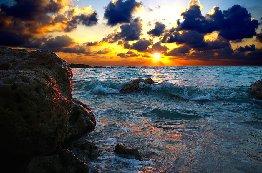 Dramatic Sunset Over Rocky Ocean Coastline With Golden Clouds HD wallpaper