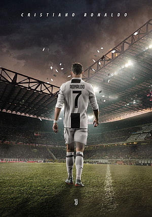Cristiano Ronaldo in Juventus Kit Walking on the Pitch Under Stadium Lights HD phone wallpaper
