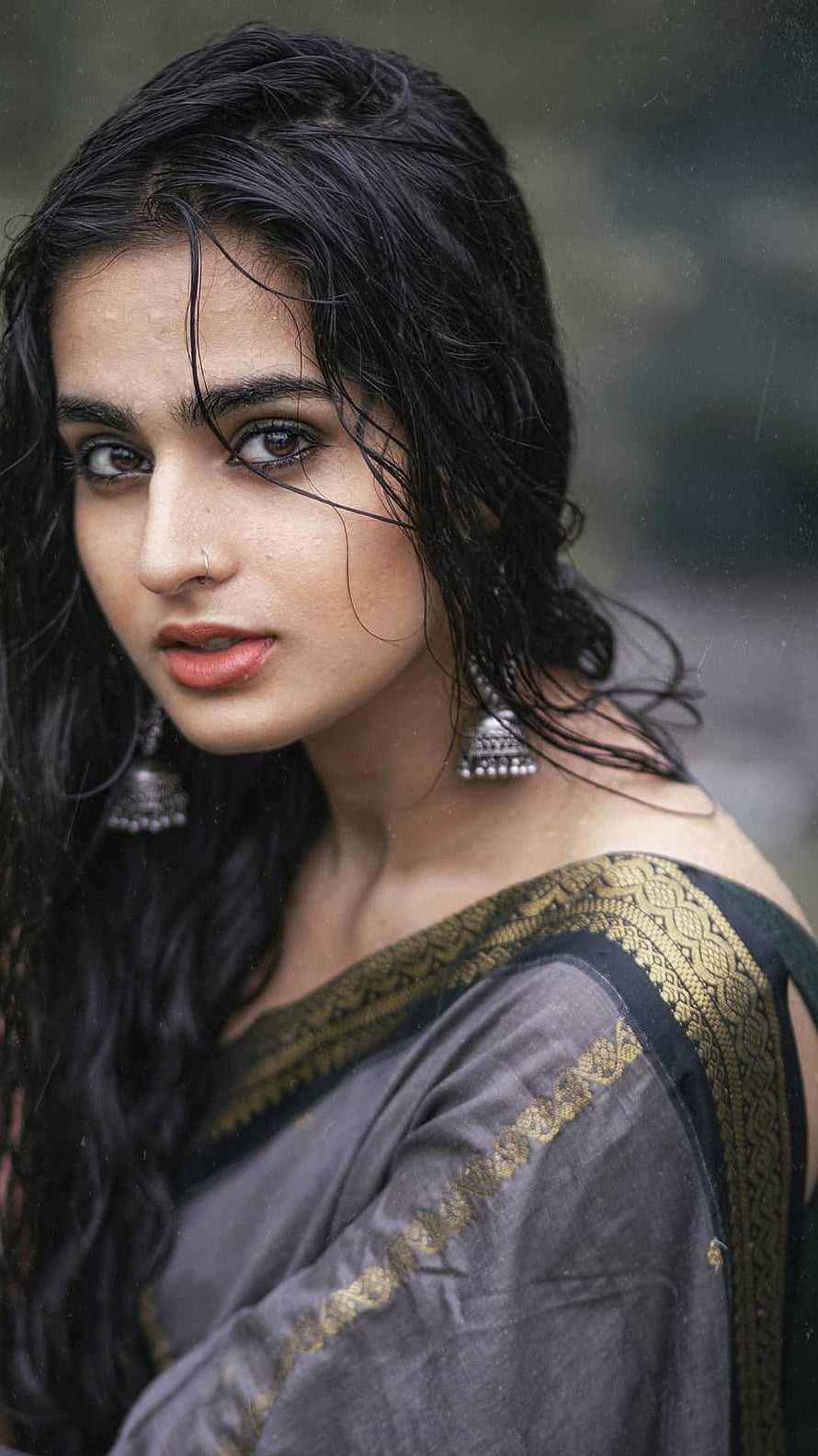 Portrait of a woman with wet hair wearing a grey saree and traditional silver jhumka earrings, Ayesha Khan, seductive, beautiful HD phone wallpaper
