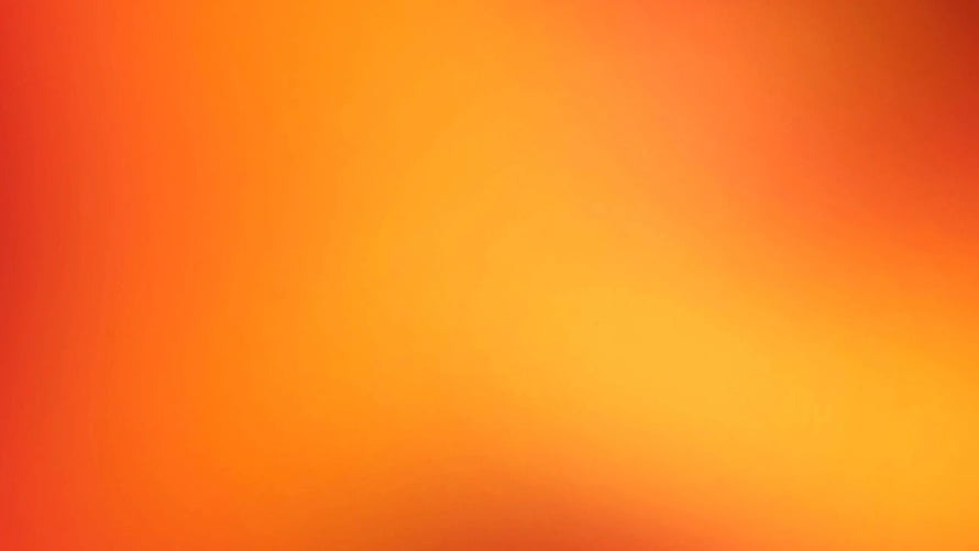 Warm Orange Gradient Background with Soft Blurred Color Transitions HD wallpaper