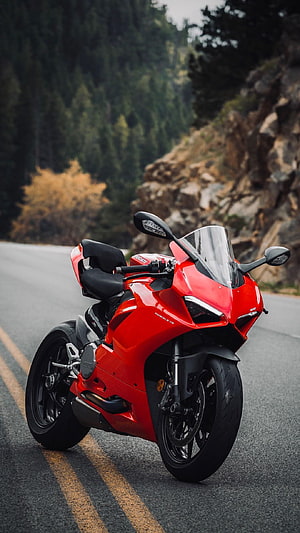 Red Ducati Panigale V4 Sportbike Parked on Mountain Road HD phone wallpaper