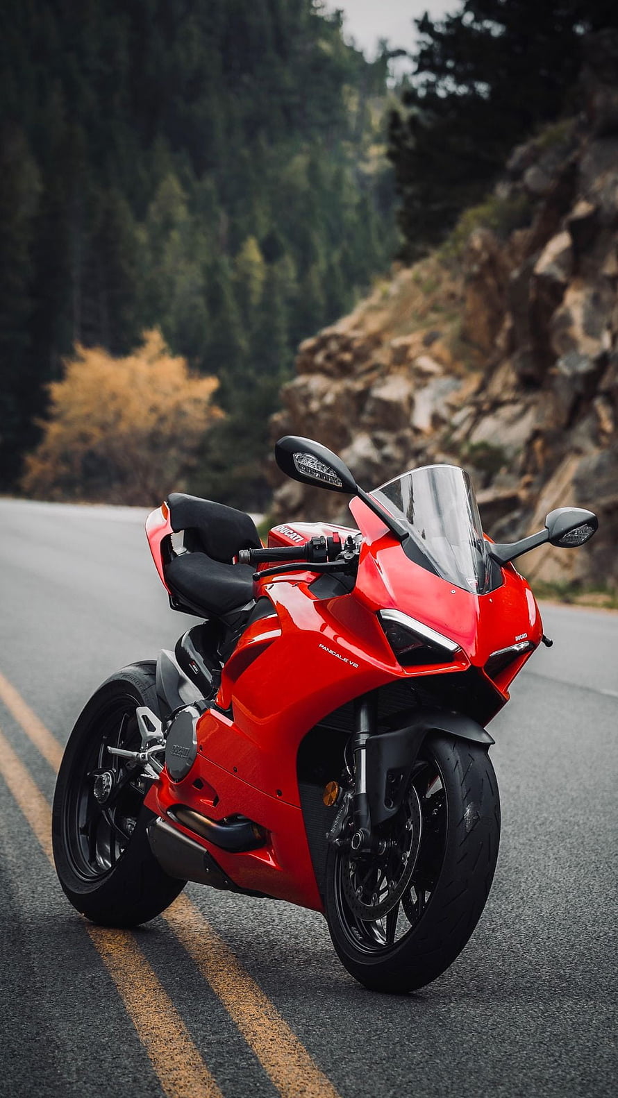 Red Ducati Panigale V4 Sportbike Parked on Mountain Road HD phone wallpaper