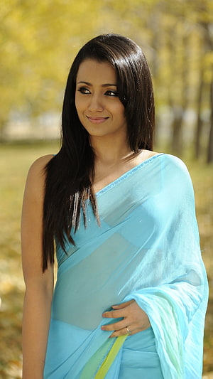 Trisha Krishnan in a Light Blue Saree with a Soft Outdoor Portrait HD phone wallpaper