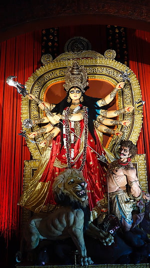 Durga Puja Idol of Goddess Durga Slaying Mahishasura on Lion HD phone wallpaper