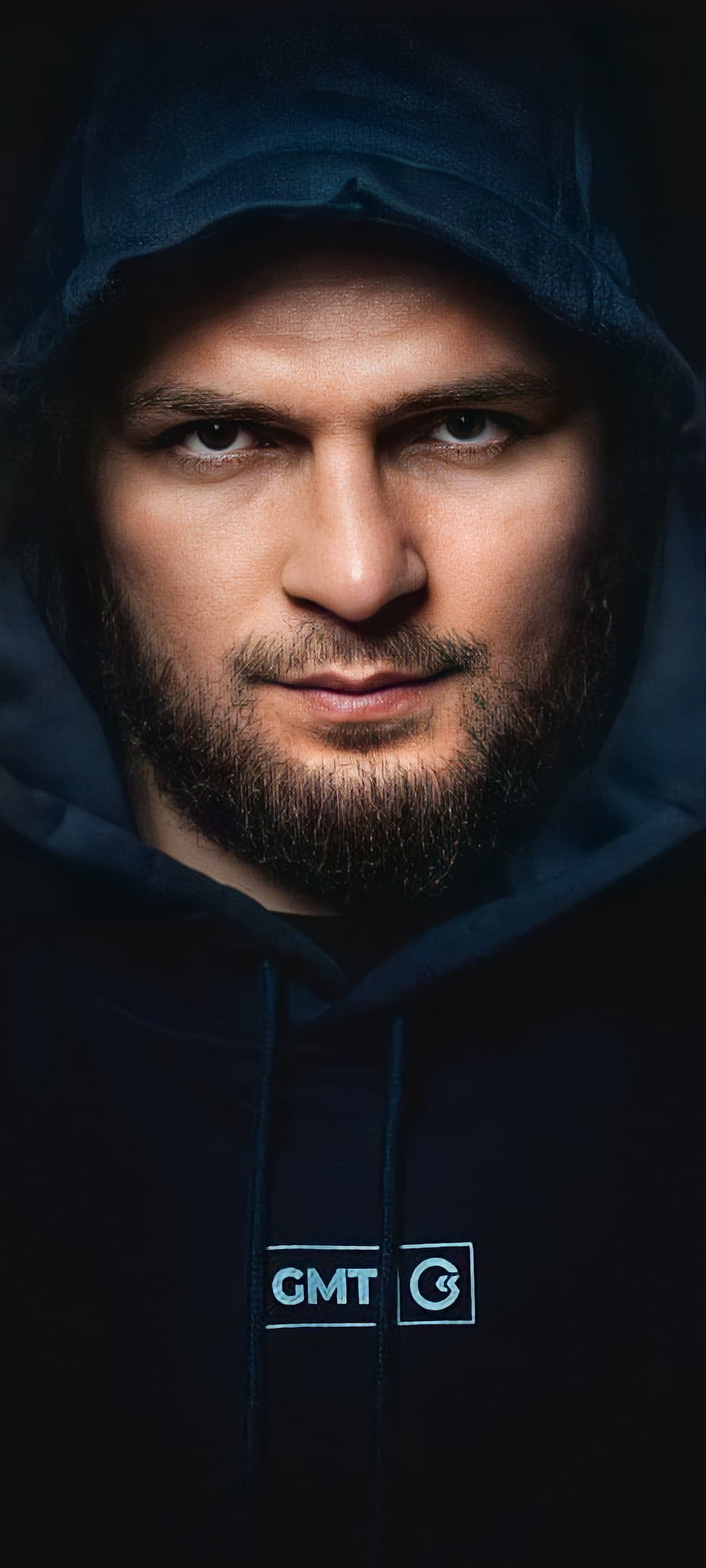 Khabib Nurmagomedov Intense Portrait in Dark Hoodie with GMB Logo HD phone wallpaper