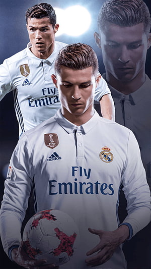 Cristiano Ronaldo in Real Madrid White Kit Holding Soccer Ball HD phone wallpaper