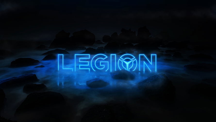 Lenovo Legion glowing blue logo over dark misty rocky terrain HD wallpaper