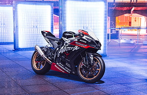 Kawasaki Ninja ZX-10R Superbike with Gold Wheels in Neon-Lit Urban Setting HD wallpaper