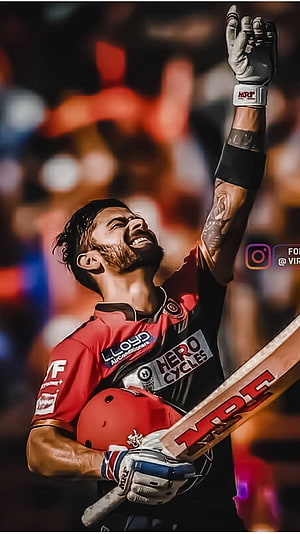 Virat Kohli Celebrating Victory in Royal Challengers Bangalore Cricket Jersey HD phone wallpaper