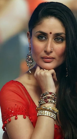 Kareena Kapoor Khan in a stunning red outfit with traditional jewelry and elegant makeup HD phone wallpaper