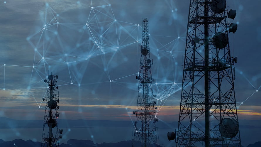 Telecommunications Network Towers with Digital Connectivity Overlay at Dusk HD wallpaper
