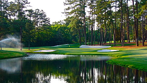 Augusta National Golf Course Scenery with Water Hazard and Pine Trees HD wallpaper