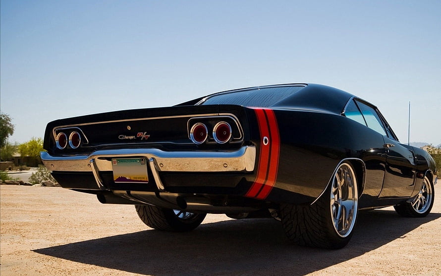 Black 1968 Dodge Charger R/T Rear Three-Quarter View with Red Stripes and Chrome Wheels HD wallpaper