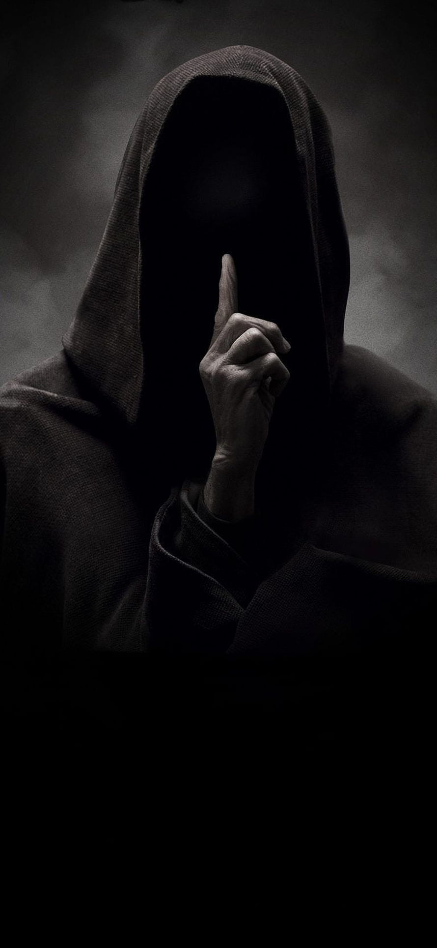 Mysterious Hooded Figure With Finger To Lips In Dark Foggy Atmosphere HD phone wallpaper