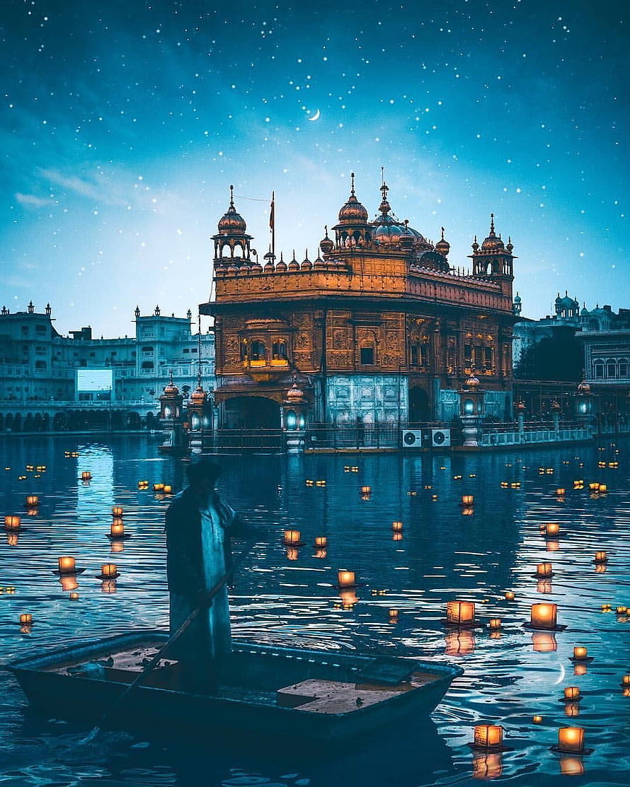 Golden Temple Amritsar at Night with Floating Diyas and Starry Sky HD phone wallpaper
