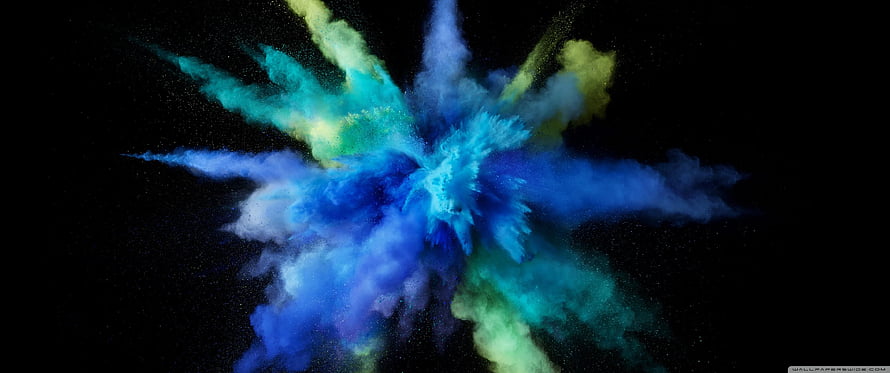 Vibrant Cyan and Blue Powder Explosion on Black Background HD wallpaper