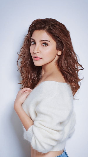 Anushka Sharma in a White Off-Shoulder Sweater Portrait HD phone wallpaper
