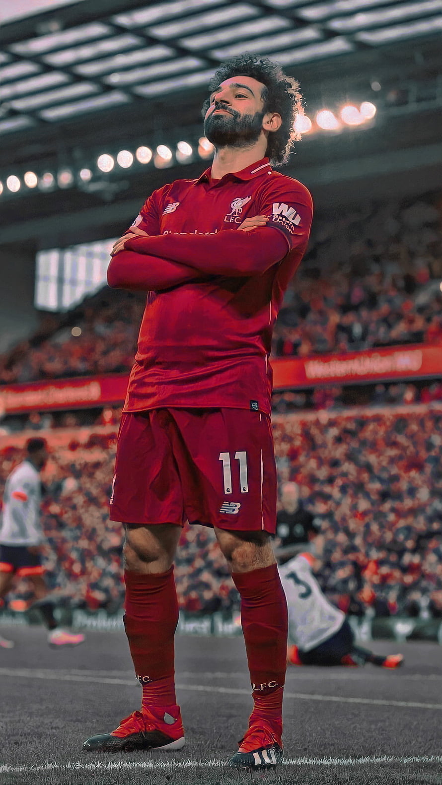 Mo Salah in Liverpool Home Kit Standing on the Pitch with Arms Crossed HD phone wallpaper