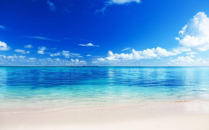Serene Tropical Beach With Crystal Clear Turquoise Water And White Sand Under Blue Sky HD wallpaper