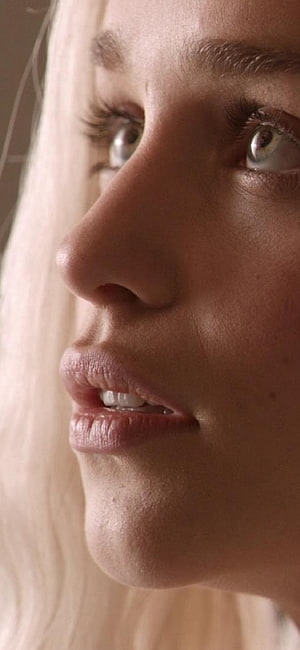 Emilia Clarke Close-Up Portrait with Soft Natural Lighting HD phone wallpaper