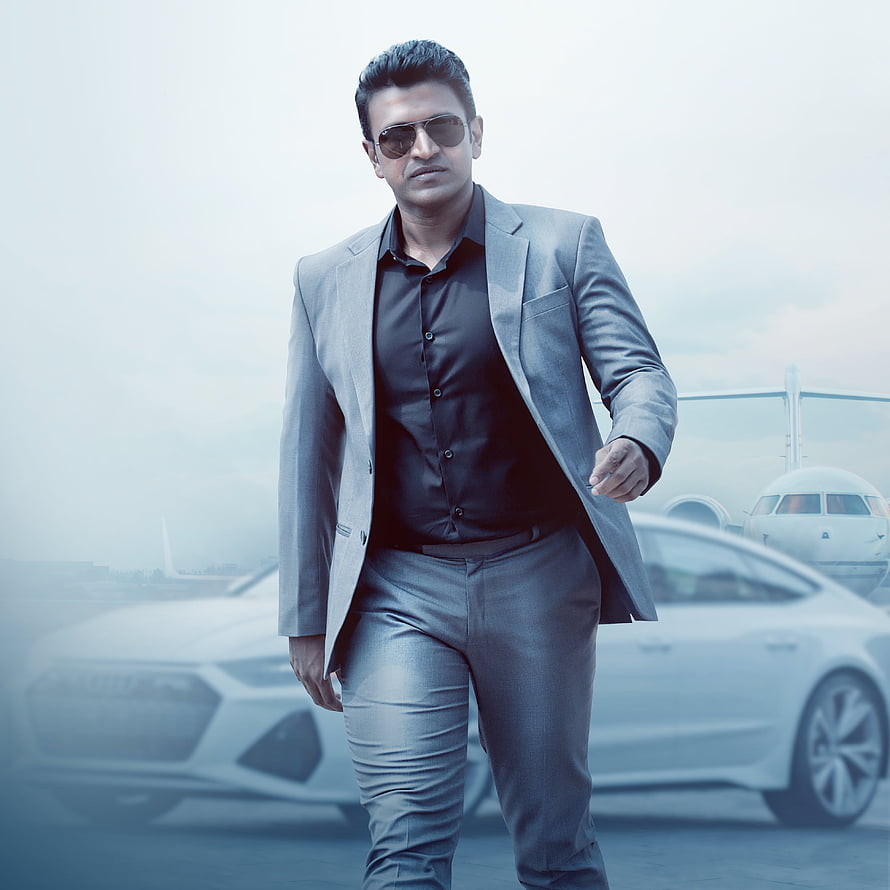 Stylish man in grey suit and sunglasses walking confidently with luxury car and private jet background, Puneeth Rajkumar, coat, suite, appu, class HD phone wallpaper