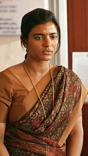 Aishwarya Rajesh in Traditional Saree with Serious Expression HD phone wallpaper
