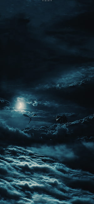Two Dragons Soaring Through Stormy Night Clouds Under a Crescent Moon HD phone wallpaper
