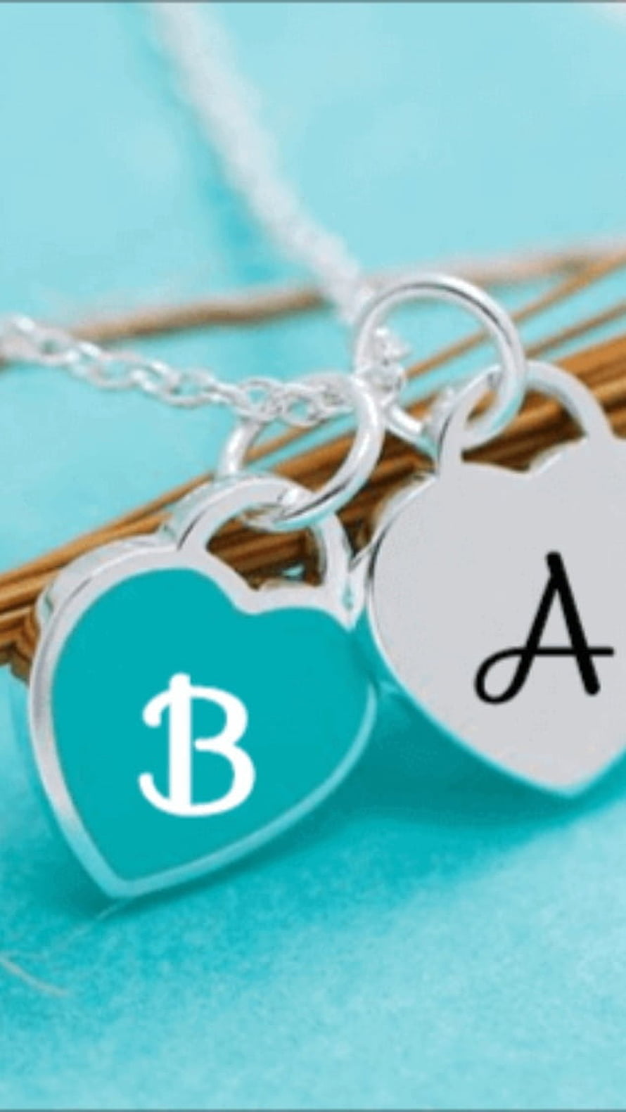 Personalized Heart Pendant Necklaces with Initials A and B on Turquoise Background HD phone wallpaper