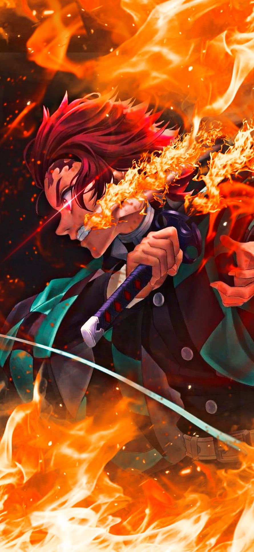 Rengoku Kyojuro from Demon Slayer wielding his flaming Nichirin sword in a dynamic battle pose surrounded by intense fire HD phone wallpaper