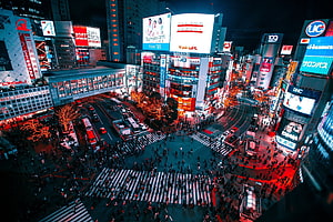 Shibuya Crossing at Night: Tokyo's Iconic Scramble Intersection with Neon Billboards HD wallpaper