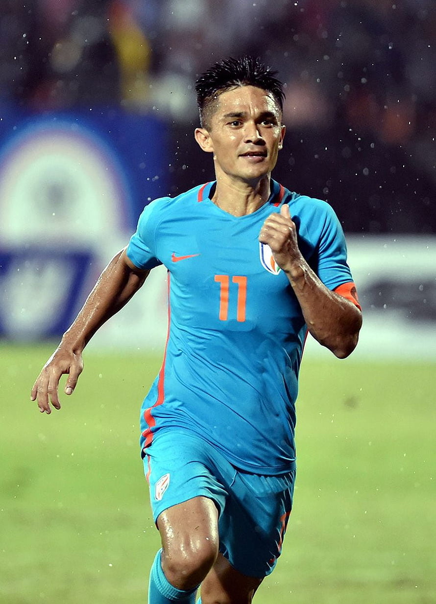 Sunil Chhetri in India Blue Kit Sprinting on the Pitch During a Rainy International Match HD phone wallpaper