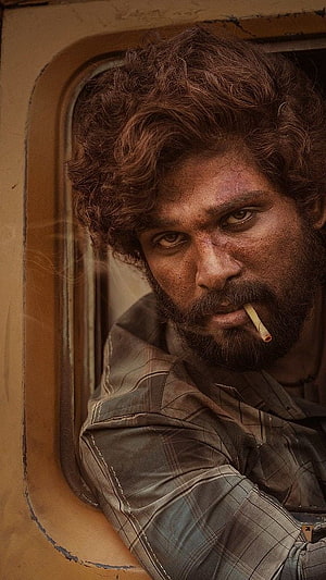 Alluri Sitarama Raju intense close-up portrait smoking cigarette in train window HD phone wallpaper