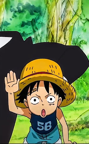 Young Monkey D. Luffy Waving in a Lush Green Forest from One Piece HD phone wallpaper