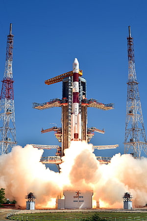ISRO PSLV-C34 rocket launch from SDSC SHAR with billowing smoke and clear blue sky HD phone wallpaper