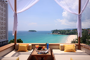 Luxury Balcony Lounge with Tropical Ocean View and Fresh Fruit Platter HD wallpaper
