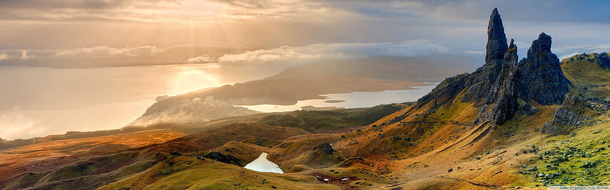 Dramatic Scottish Highlands Landscape with Rocky Peaks and Golden Sunset HD wallpaper