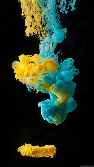 Vibrant Yellow and Cyan Ink Diffusing in Water Against a Black Background HD phone wallpaper