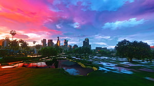 Vice City Sunset Park Scene From GTA V With Vibrant Skyline And Water Reflections HD wallpaper