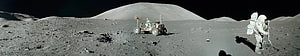 Astronaut and Lunar Roving Vehicle on the Moon's Surface with Cratered Horizon HD wallpaper