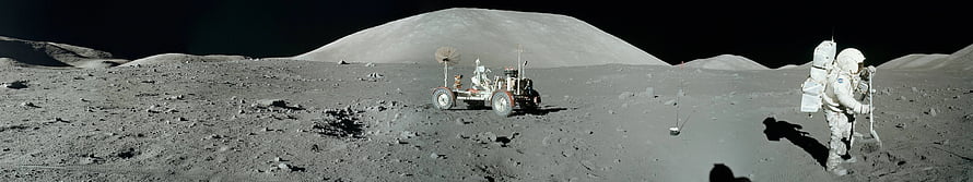 Astronaut and Lunar Roving Vehicle on the Moon's Surface with Cratered Horizon HD wallpaper