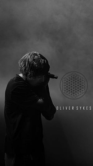 Oliver Sykes in Moody Black and White Portrait with Geometric Flower of Life Design HD phone wallpaper