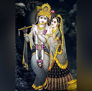 Radha Krishna Playing Flute in Traditional Attire with Peacock HD wallpaper
