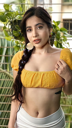 Woman in Yellow Crop Top and White Skirt with Braided Hair and Feather Tattoo, Urfi Javed, navel HD phone wallpaper