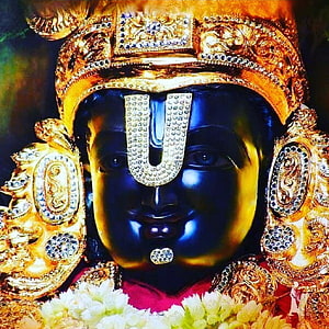 Close-up Portrait of Lord Krishna Statue with Golden Crown and Jewels HD phone wallpaper