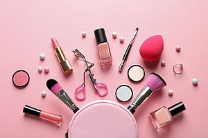 Pastel Pink Makeup Tools Flat Lay With Lipstick, Brushes, And Beauty Sponge HD wallpaper