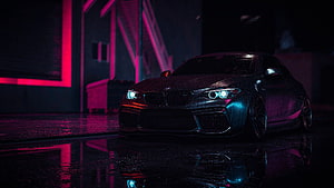 Sleek BMW M2 Coupe in Neon-Lit Rainy Night Cyberpunk Scene HD wallpaper