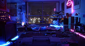 Cinematic Neon-Lit Apartment Interior With Person Lying On Floor HD wallpaper