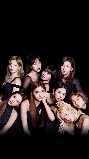 ITZY K-pop girl group members posing in black outfits against a dark background HD phone wallpaper