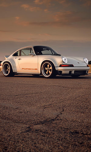 White Porsche 911 Widebody Coupe on Asphalt at Sunset HD phone wallpaper