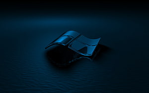 Glossy Blue Windows Logo Floating on Dark Water Surface HD wallpaper